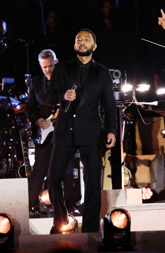 John Legend wears custom Louis Vuitton menswear at the Grace for the World concert