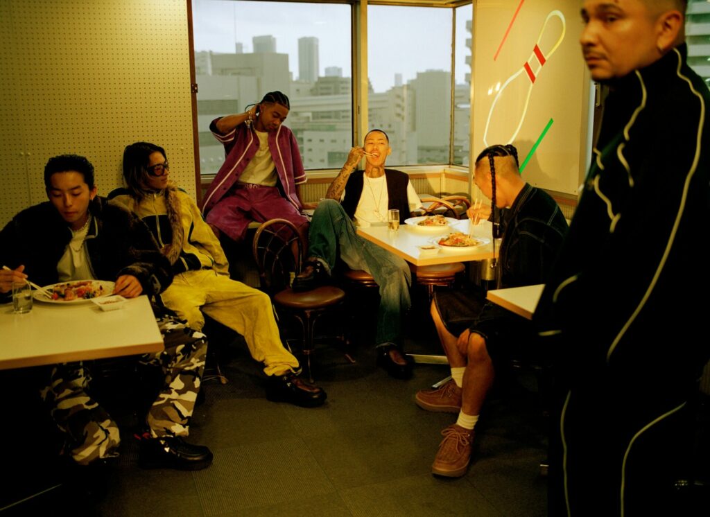 A group shot of models wearing the AMBUSH and UGG autumn/winter 2025 collaboration.