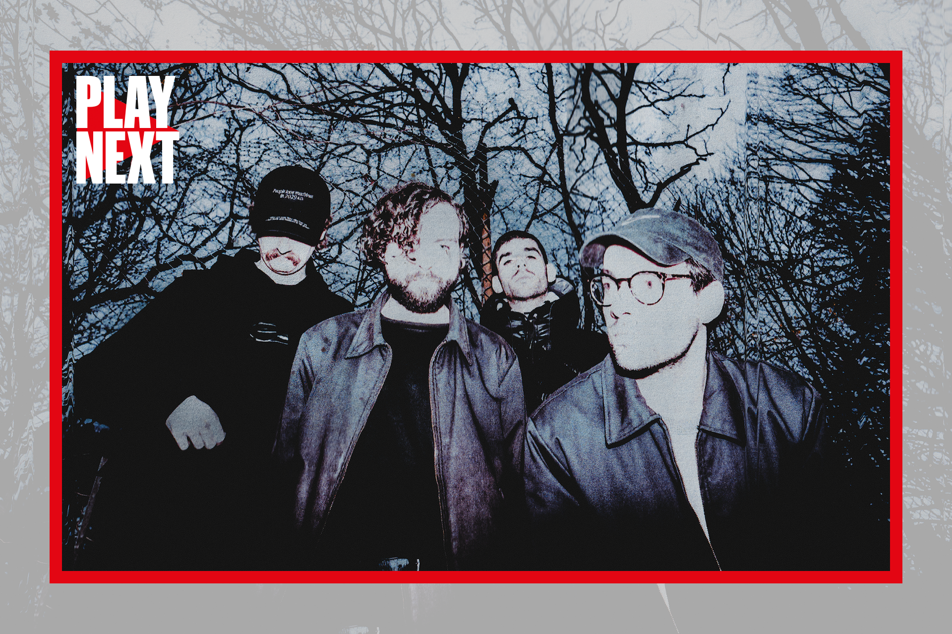 The band SCALER pose for the camera in the woods at dusk