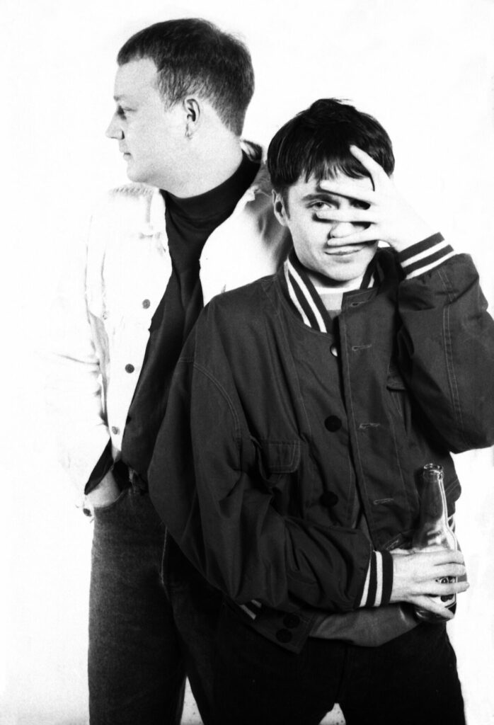 A black-and-white portrait photograph of a raver