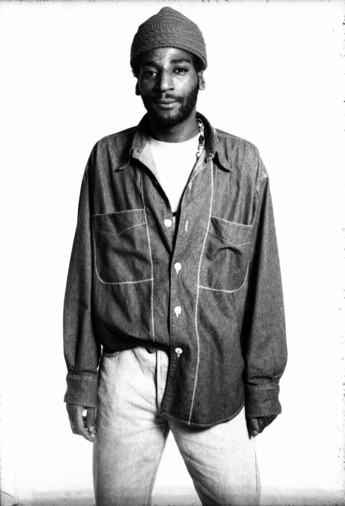 A black-and-white portrait photograph of a raver