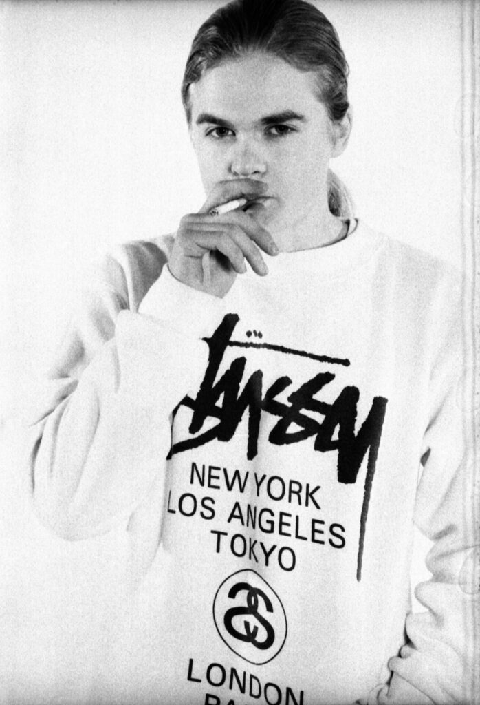 A black-and-white portrait photograph of a raver