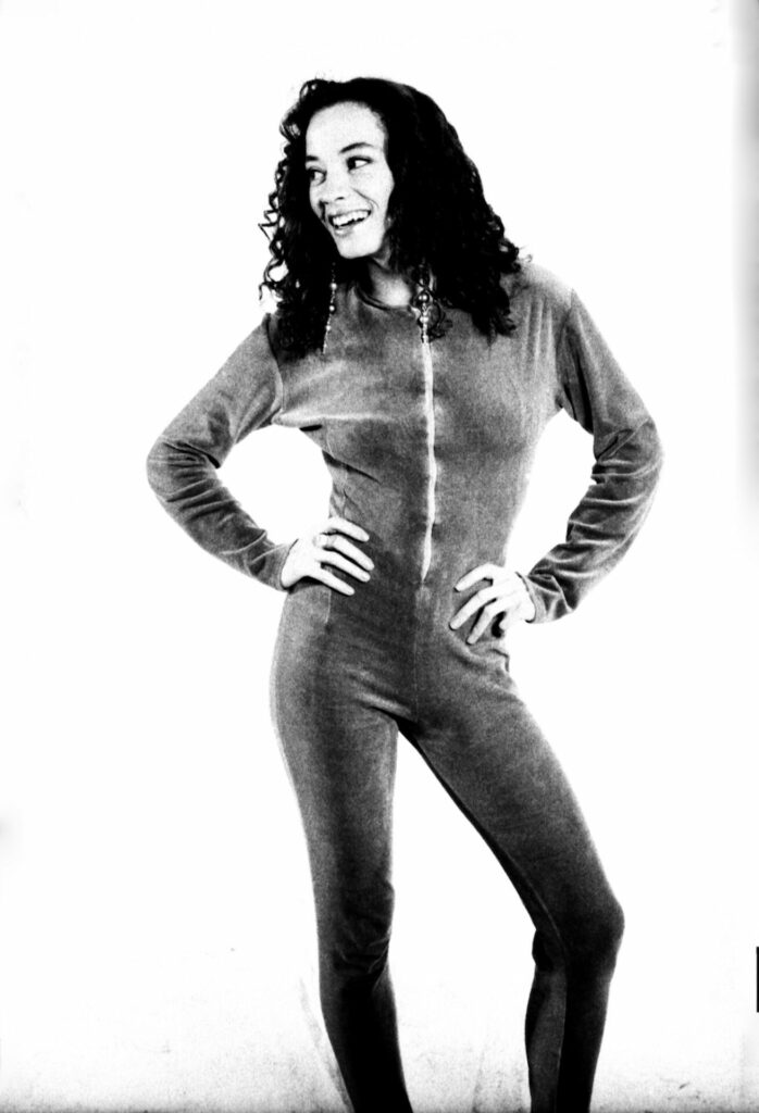 A black-and-white portrait photograph of a raver