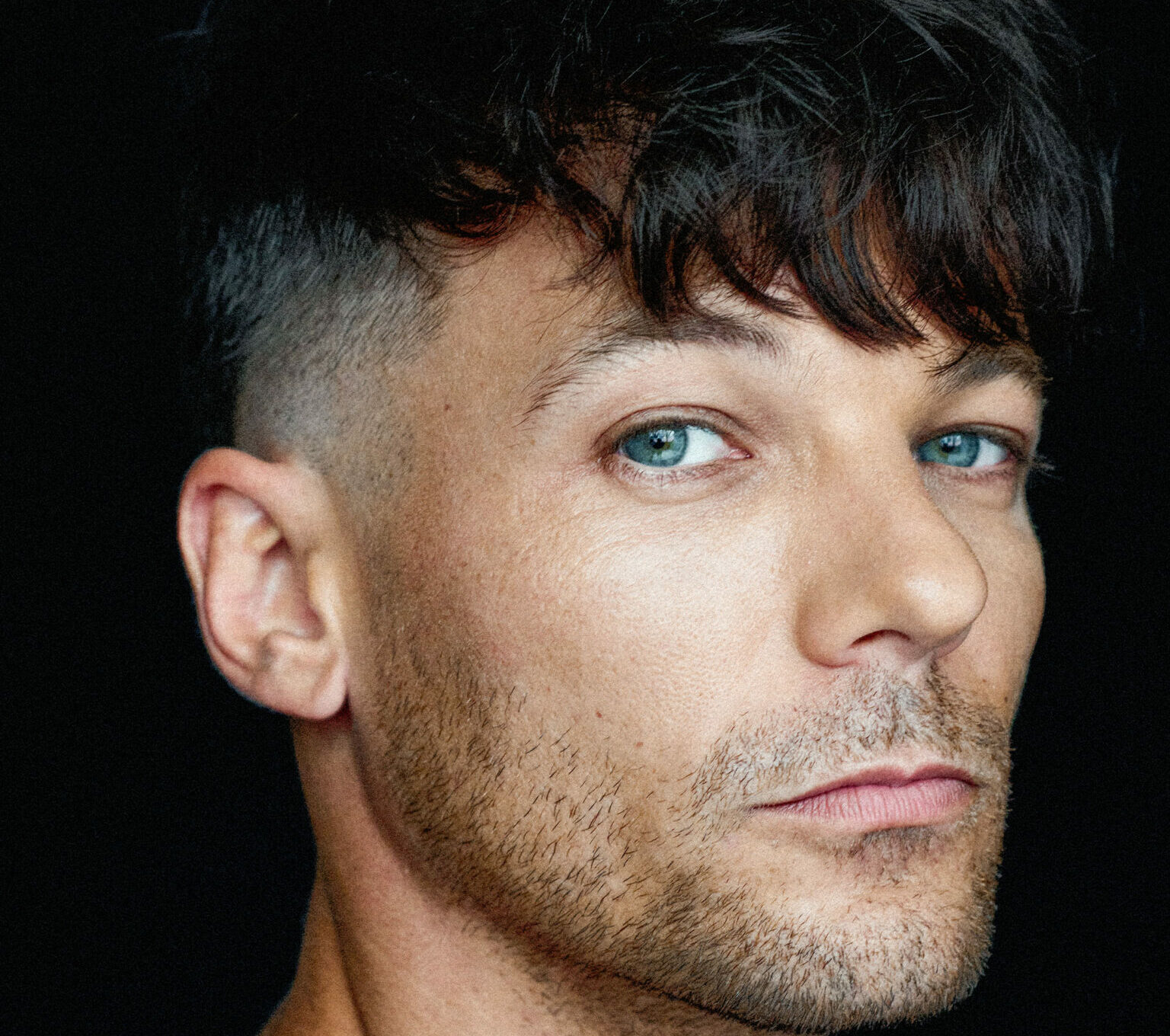 Louis Tomlinson poses for Rolling Stone UK (Picture: Kosmas Pavlos)