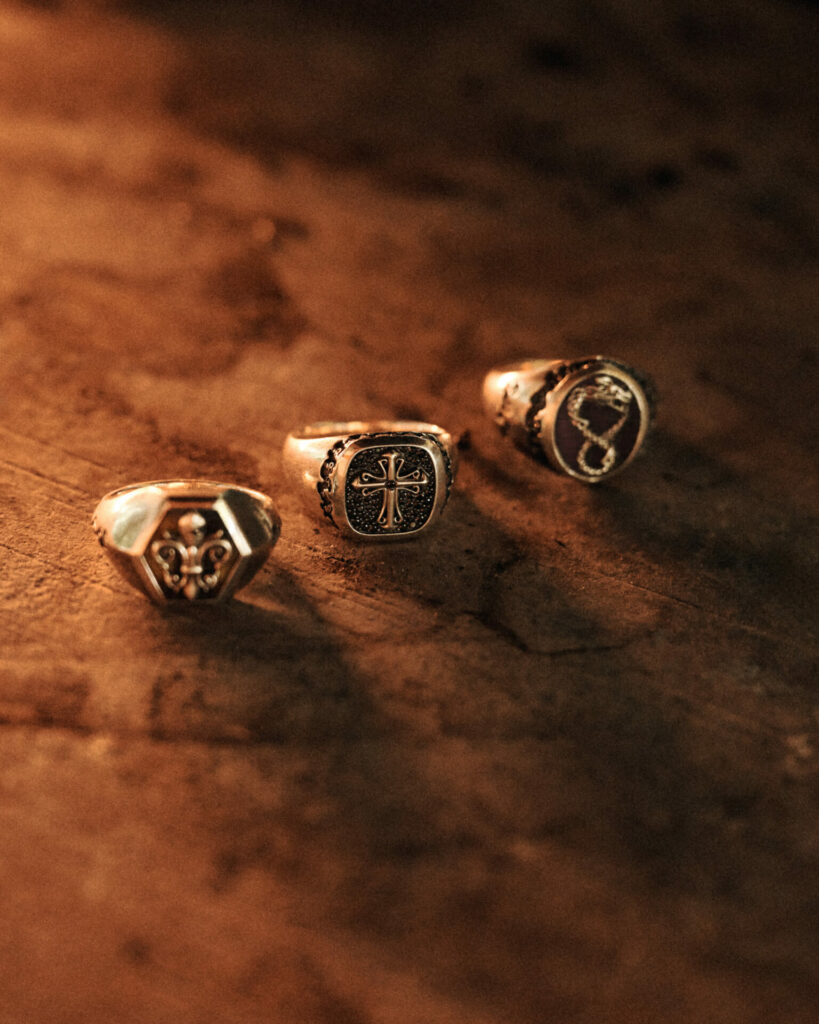Lifestyle shot of three signet rings from the Thomas Sabo Rebel Icons collection.