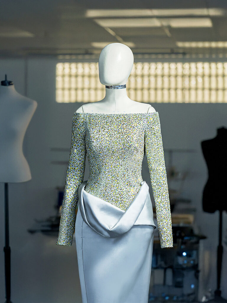 A behind the scenes look at the making of Raye custom Ferrari Style look for The Fashion Awards 2025