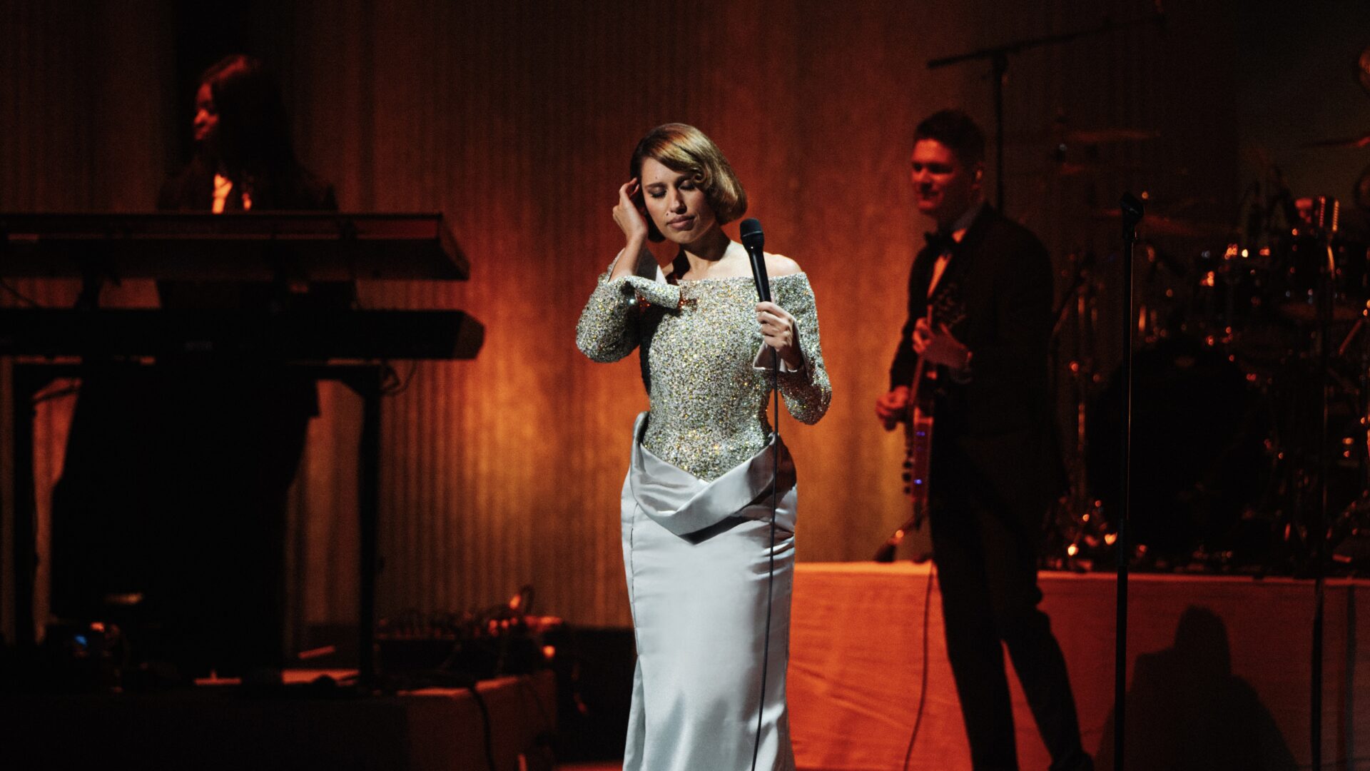 Musician Raye performs at The Fashion Awards 2025 in a custom Ferrari Style gown