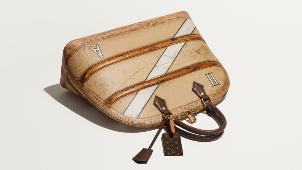 Still life of the Louis Vuitton Time Trunk Alma GM from the Louis Vuitton Monogram Anniversary collection