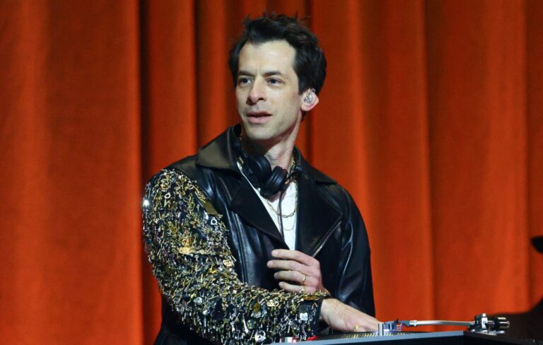 Mark Ronson performs on stage during The BRIT Awards