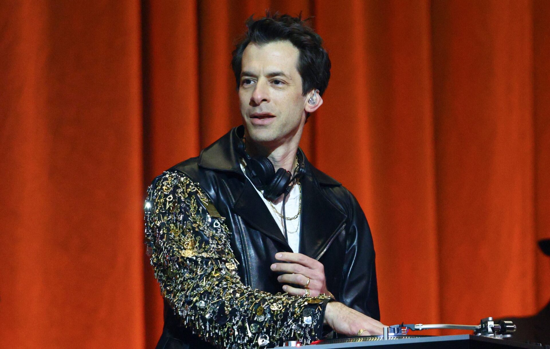Mark Ronson performs on stage during The BRIT Awards