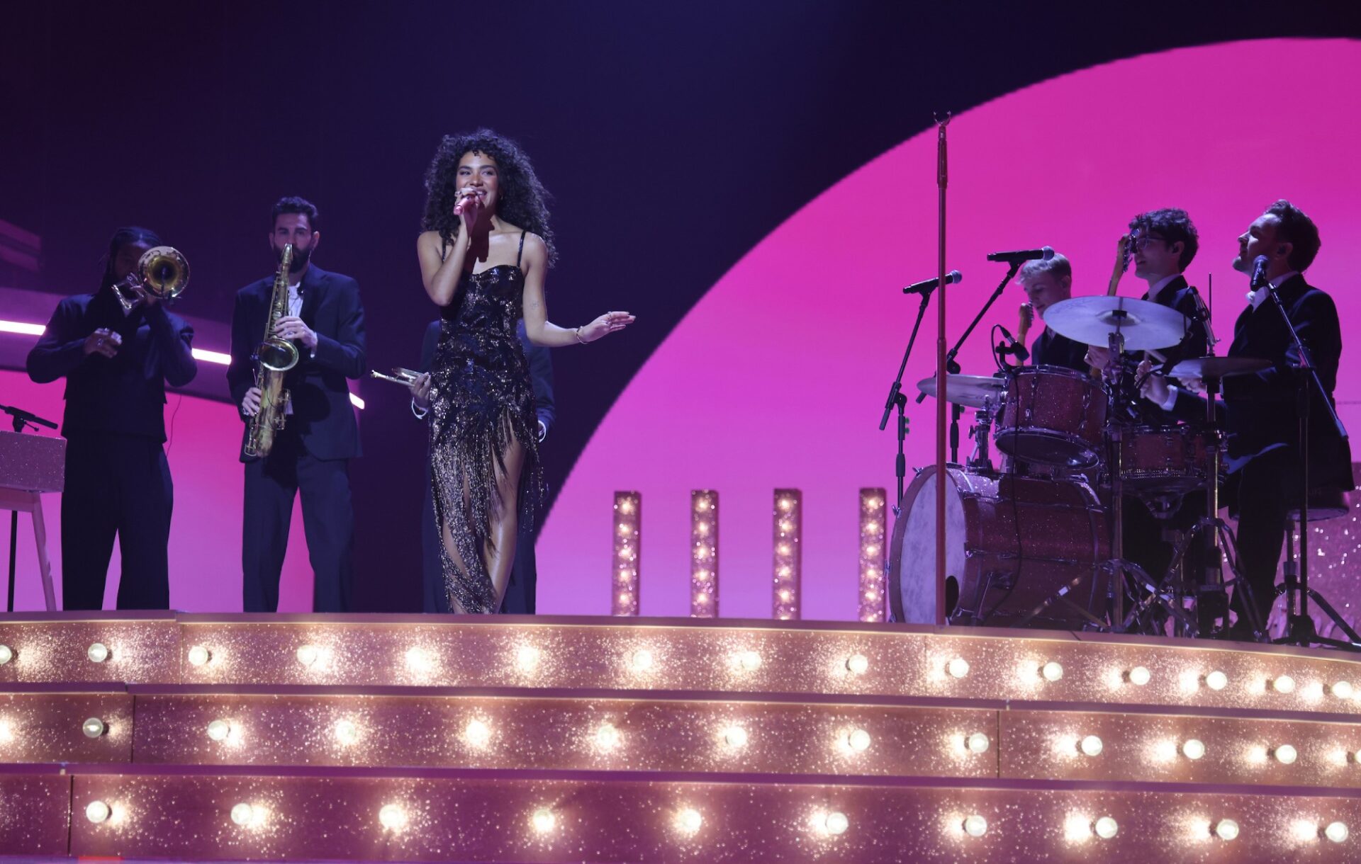 Olivia Dean performs on stage during The BRIT Awards 2026