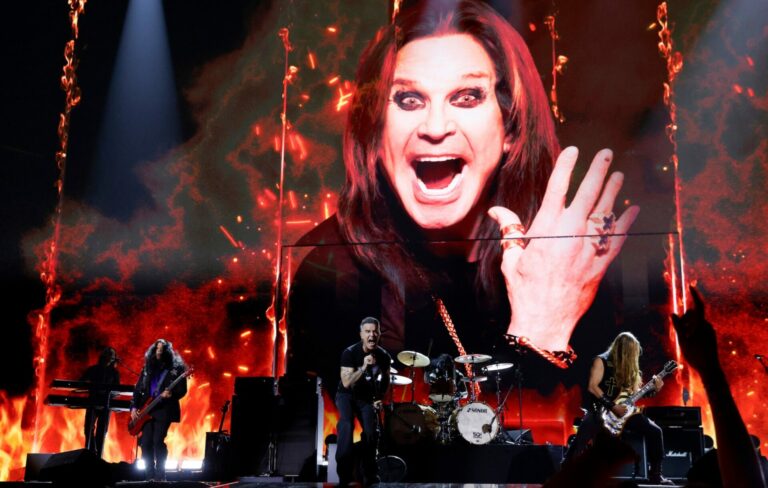 Robbie Williams performs on stage in tribute to Ozzy Osbourne during The BRIT Awards 2026