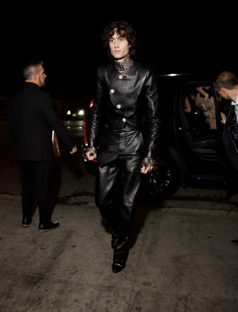 Sombr wearing custom leather Valentino look with lace shirt at the 68th Grammy Awards afterparty