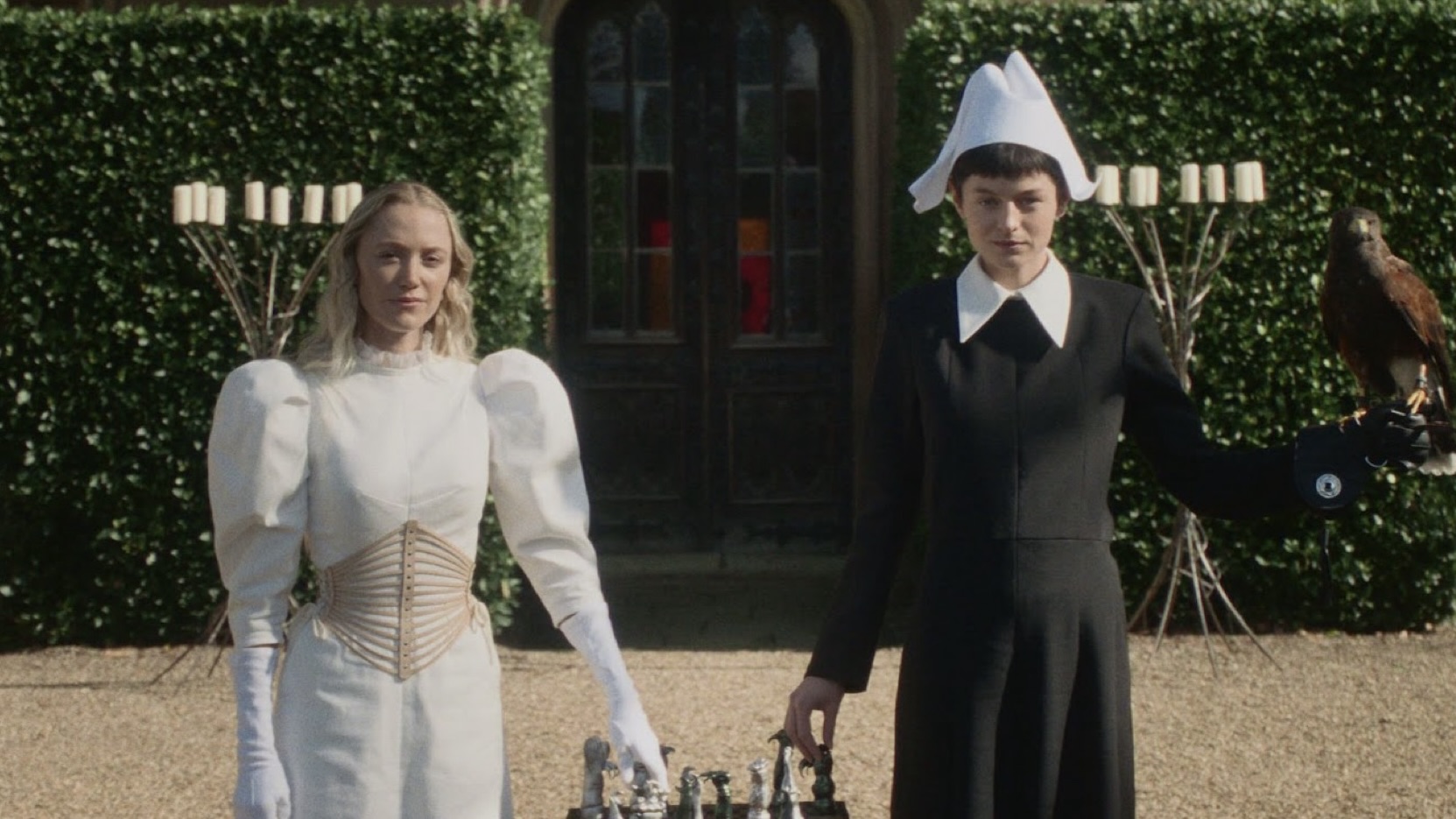 Film still from 100 Nights of Hero starring Maika Monroe and Emma Corrin